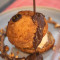 Craquelin Puff With Vanilla Ice-Cream, Hazelnuts Praline And Chocolate Sauce